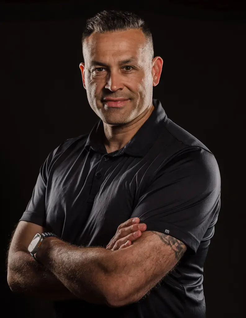 Professional portrait of Aaron Guzman, founder of Aaron Guzman Photography.